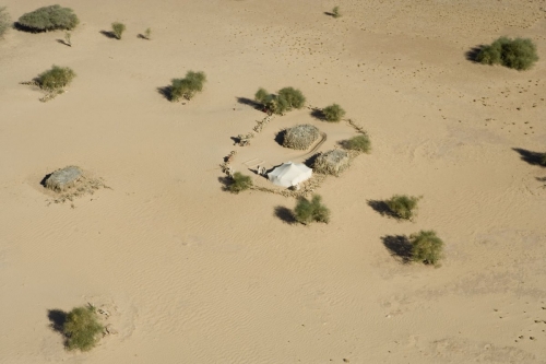 Vue aérienne d'un campement de nomades dans désert du basin de Taoudéni en Mauritanie. | Philippe DUREUIL Photographie