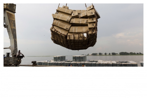 Photographie industrielle de reportage, déchargement d'une barge. | Philippe DUREUIL Photographie