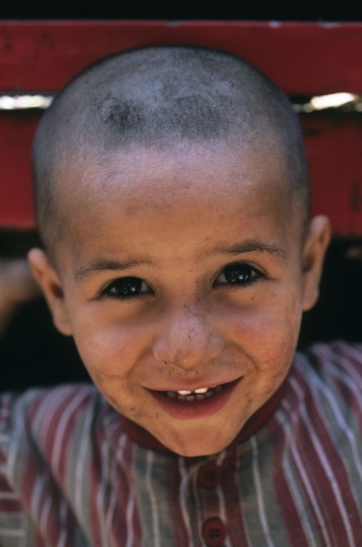 Portrait d'un jeune chiffonnier souriant | Philippe DUREUIL Photographie